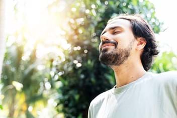 Man soaking in the vitamin d from the sun