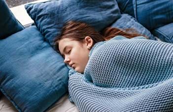 teenager sleeping in at winter time