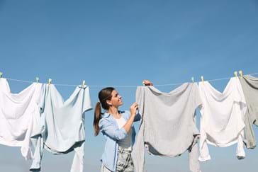 hanging clothes on the line to dry