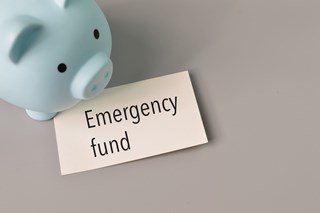 blue piggy bank for an emergency fund